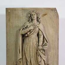 Carved oak panel of saint Philomena, France circa 1750-1850