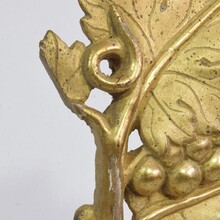 Giltwood hand holding a branch of grapes, Italy circa 1750