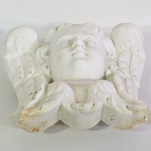 Carved white marble winged angel head, Italy circa 1650-1750