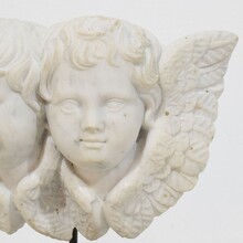 Carved white marble winged double angle head ornament, Italy circa 1750