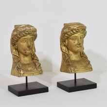 Pair hand carved giltwood empire style head ornaments, France circa 1805-1820