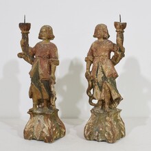 Pair baroque angel figures with candleholders, Italy circa 1650-1700