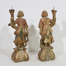 Pair baroque angel figures with candleholders, Italy circa 1650-1700