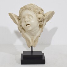 Carved white marble winged angel head ornament, Spain circa 1750