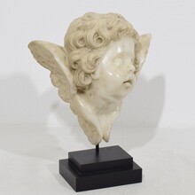 Carved white marble winged angel head, Spain circa 1750