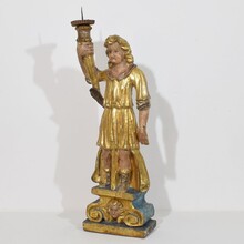 Baroque angel figure with candleholder, Italy circa 1650-1700