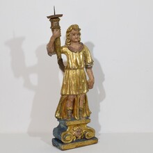 Baroque angel figure with candleholder, Italy circa 1650-1700