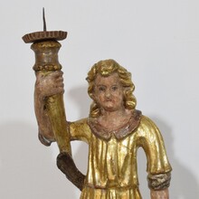 Baroque angel figure with candleholder, Italy circa 1650-1700