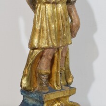 Baroque angel figure with candleholder, Italy circa 1650-1700