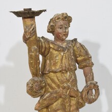 Baroque angel figure with candleholder, Italy circa 1650-1700