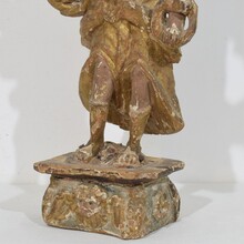 Baroque angel figure with candleholder, Italy circa 1650-1700