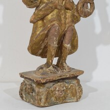 Baroque angel figure with candleholder, Italy circa 1650-1700