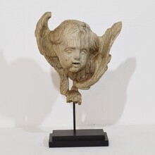 Baroque carved oak angel head on wing, France circa 1750