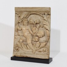 Carved oak panel depicting an angel on an acanthus curl, France circa 1750