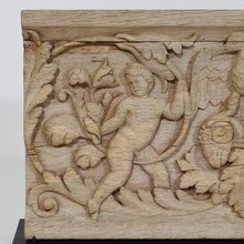 Carved oak panel depicting two angels and an eagle, France circa 1750