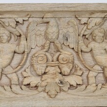 Carved oak panel depicting two angels and an eagle, France circa 1750