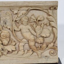 Carved oak panel depicting two angels and an eagle, France circa 1750