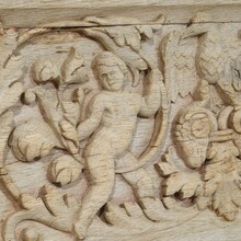 Carved oak panel depicting two angels and an eagle, France circa 1750