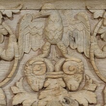 Carved oak panel depicting two angels and an eagle, France circa 1750