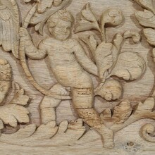 Carved oak panel depicting two angels and an eagle, France circa 1750