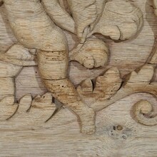 Carved oak panel depicting two angels and an eagle, France circa 1750