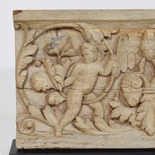 Carved oak panel depicting two angels and an eagle, France circa 1750