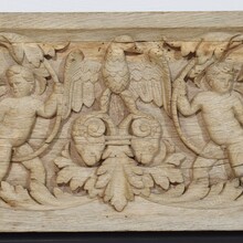 Carved oak panel depicting two angels and an eagle, France circa 1750