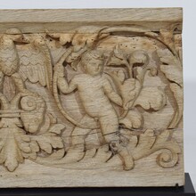 Carved oak panel depicting two angels and an eagle, France circa 1750