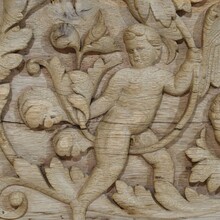 Carved oak panel depicting two angels and an eagle, France circa 1750