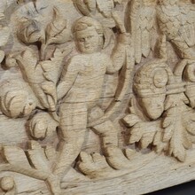 Carved oak panel depicting two angels and an eagle, France circa 1750