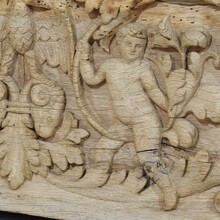 Carved oak panel depicting two angels and an eagle, France circa 1750