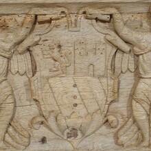 Carved oak panel depicting two angel with coat of arms, France circa 1750