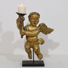 Carved wood baroque angel with candleholder, France circa 1750