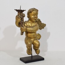 Carved wood baroque angel with candleholder, France circa 1750