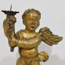 Carved wood baroque angel with candleholder, France circa 1750