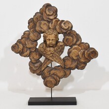 Carved oak winged angel head in clouds ornament, France circa 1800-1850