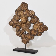 Carved oak winged angel head in clouds ornament, France circa 1800-1850