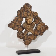 Carved oak winged angel head in clouds ornament, France circa 1800-1850