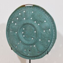 A mounted folk art brass bassinoire cover, France circa 1600-1700