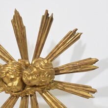 Baroque style giltwood sunburst with angelheads, Italy circa 1880-1900