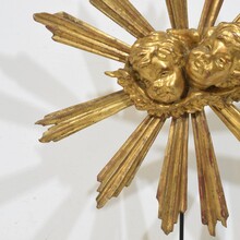 Baroque style giltwood sunburst with angelheads, Italy circa 1880-1900