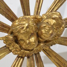 Baroque style giltwood sunburst with angelheads, Italy circa 1880-1900