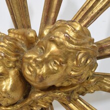Baroque style giltwood sunburst with angelheads, Italy circa 1880-1900