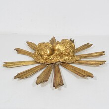 Baroque style giltwood sunburst with angelheads, Italy circa 1880-1900