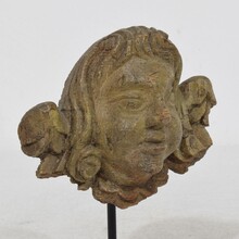 Weathered oak renaissance angel head fragment, France 16/17th century