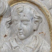 Carved wooden baroque panel depicting a Saint with angels, France circa 1650-1750