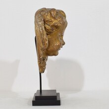 Baroque carved giltwood winged angel head, France circa 1700-1750