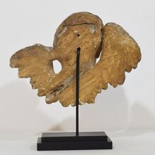 Baroque carved giltwood winged angel head, France circa 1700-1750