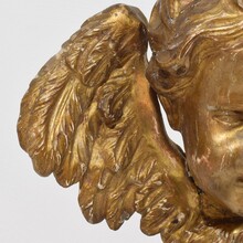 Baroque carved giltwood winged angel head, France circa 1700-1750