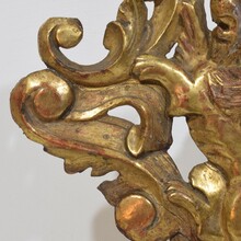 Hand carved giltwood standing lion on curl, France circa 1750